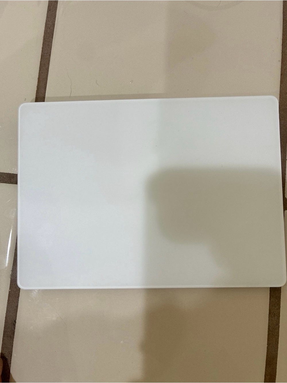 Authentic Apple Magic Trackpad 2 in white and silver.
A1535